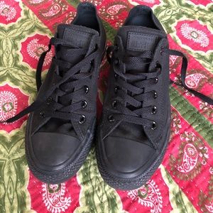 All black Converse.